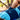 Close-up of colorful athletic socks with light blue and dark blue patterns on feet resting. Blurred trees in the background. Sporty and vibrant mood.