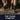 Two people wearing hiking shoes and socks on a trail with 'Balega' branding.
